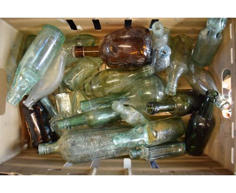 A collection of vintage glass bottles to include various local interest such as William Stretch Ltd of Uttoxeter, Longton, Cr