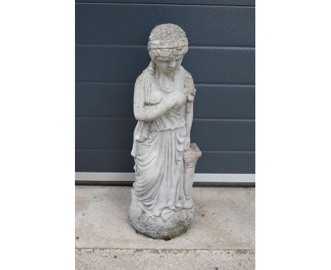 A vintage garden statue in the form of a classical lady in robes, 62cm tall. 
