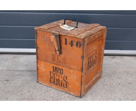 A vintage 20th century wooden egg crate with either 'WCB' or 'WGB' with 'EGGS' on each side and a box/ stock number. Great st