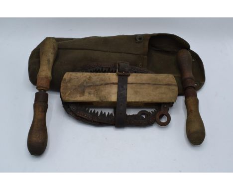 Army folding saw in a carry bag 