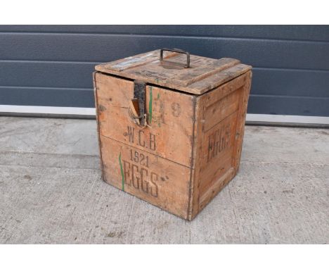 A vintage 20th century wooden egg crate with either 'WCB' or 'WGB' with 'EGGS' on each side and a box/ stock number. Great st
