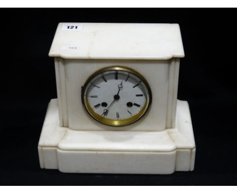     A White Marbled Encased Mantle Clock With Circular Enamel Dial                  
