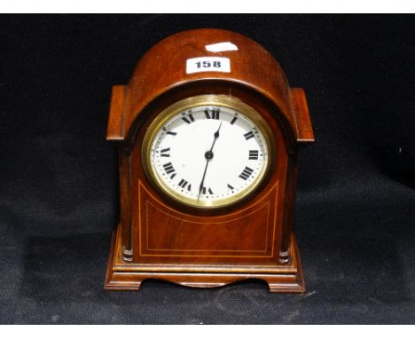     An Edwardian Mahogany And Inlaid Mantle Clock                                    