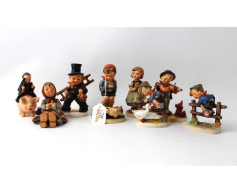 Eight Hummel figures