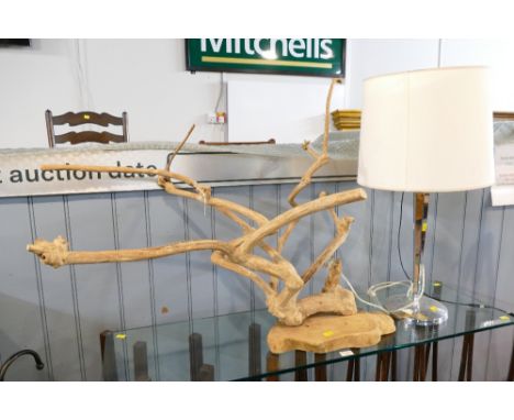 Driftwood twig ornament +/- 90 cm long, 80 cm high, and a chrome based table lamp with shade