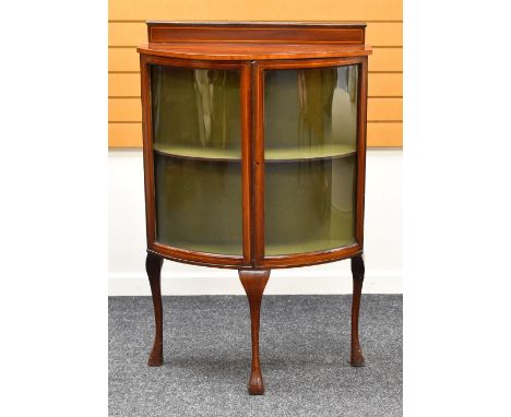 A TWO-DOOR INLAID MAHOGANY BOW FRONT CHINA CABINET on cabriole corner supports and with railback