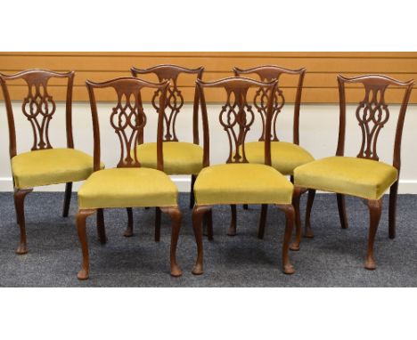 A SET OF SIX CHIPPENDALE-STYLE CHAIRS with stuff over green upholstered seats