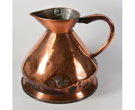 A TWO GALLON ANTIQUE COPPER MEASURE of traditional conical form, bearing label for W R LOFTUS of London