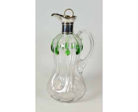 A GLASS DECANTER WITH SILVER COLLAR & SPOUT having a handle and swirling waisted body with green glass decoration, Sheffield 