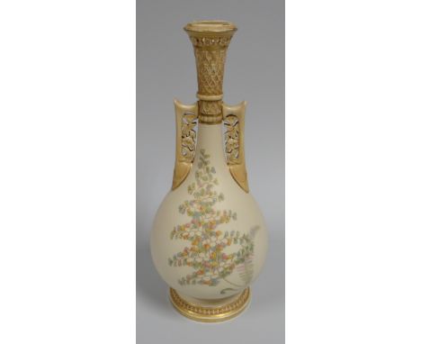 A ROYAL WORCESTER TWIN HANDLED VASE with narrow neck and openwork to the neck and handles on a circular foot, decorated with 