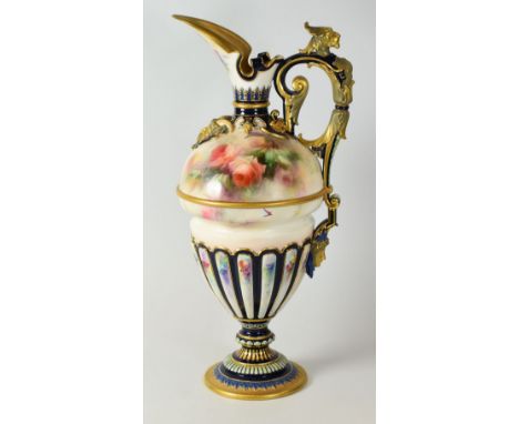 A HADLEY WORCESTER CLARET JUG of elaborate Classical form with spear spout and fluted decoration over a circular foot and wit