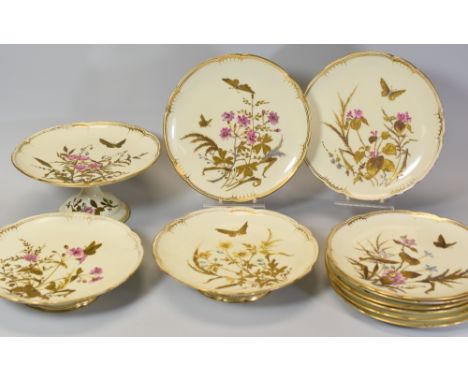 A DERBY PORCELAIN PART DESSERT SET decorated in enamel and gilding with butterflies and wild-flowers to an ivory ground and c