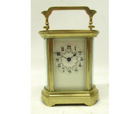 20th Century French brass 8 day carriage clock timepiece, oval gorge four glass case, 2" white enamel Arabic dial, the centre