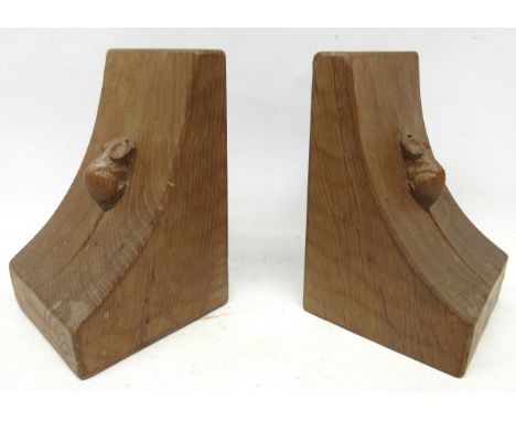 Robert Mouseman Thompson of Kilburn - a pair of adzed oak bookends, carved with signature single mice, W9.5cm D9.5cm H15cm (2