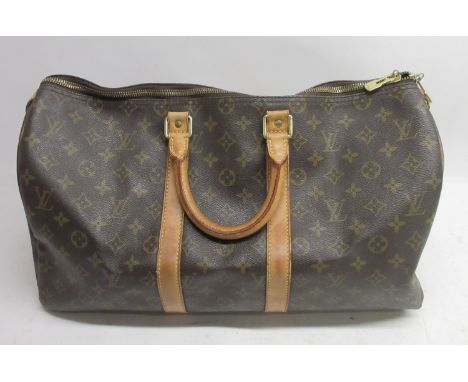 Louis Vuitton Keepall 45, canvas monogram duffle bag with tan leather handles and strapwork, gold tone hardware 45cm X 27cm X