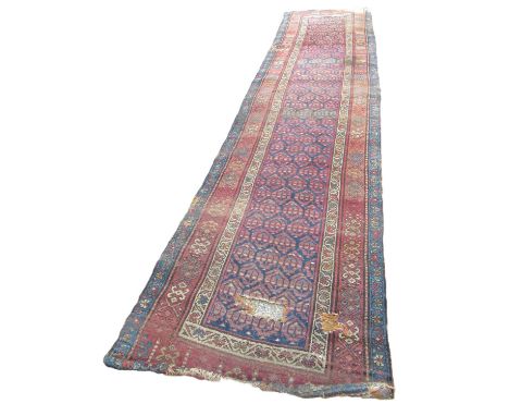Constable Burton Hall - multicoloured Caucasian wool runner, field with repeating hexagonal medallions in striped border, and