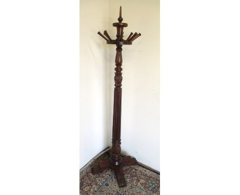 Victorian style mahogany hat and coat stand, turned finial with eight pegs on fluted column and cross base, W36cm D36cm H170P