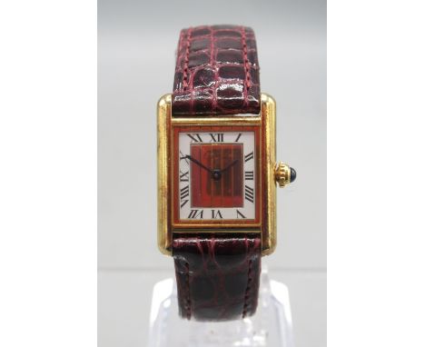 Must de Cartier Tank ladies silver gilt quartz wristwatch on brown leather strap, signed dial with white Roman chapter ring, 