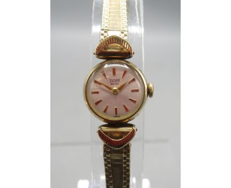 Tudor Royal ladies 9ct gold wristwatch on period 12ct rolled gold bracelet, signed sunburst silvered dial with baton indices,