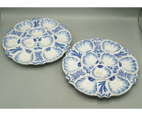 Pair of 19th century J. Vieillard & Cie Bordeaux blue and white transfer printed circular oyster dishes, on ball feet, with p