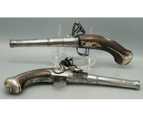 Pair of Queen Anne 16 bore flintlock pistols by Bennett, London, 6" turn-off staged cannon barrels, faintly named to the acti