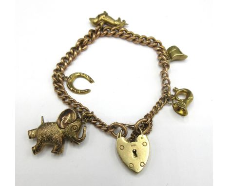 Victorian 9ct rose gold charm bracelet set with yellow gold charms including dachshund and elephant, with yellow gold heart p