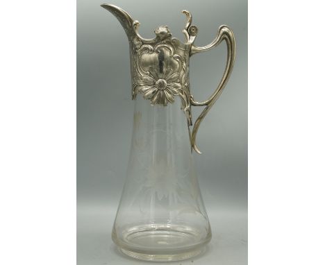 Early 20th century Claret jug, tapered glass body etched with flowers and with Art Nouveau EPNS whiplash handle and floral sc