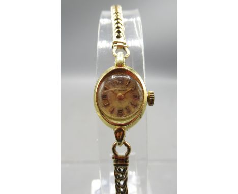 Rotary ladies 18ct gold wristwatch on 9ct gold belcher square link bracelet, Birmingham 1964, signed silvered dial with Arabi