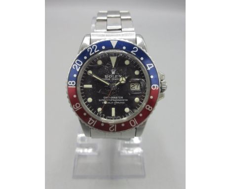Rolex Oyster Perpetual GMT-Master stainless steel automatic wristwatch with date on matching riveted oyster bracelet with sig