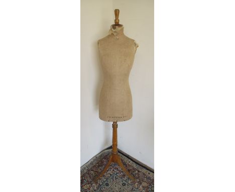 Carlton Towers - an A.W. Gamage Ltd. Holborn torso mannequin, on turned tripod base, W30cm D20cm H163cmPOA  https://www.bradl