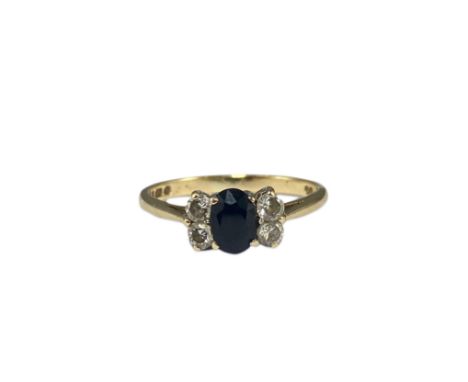 9ct Yellow Gold London 1982 Sapphire and White Stone ring weighing 1.53 grams size K 