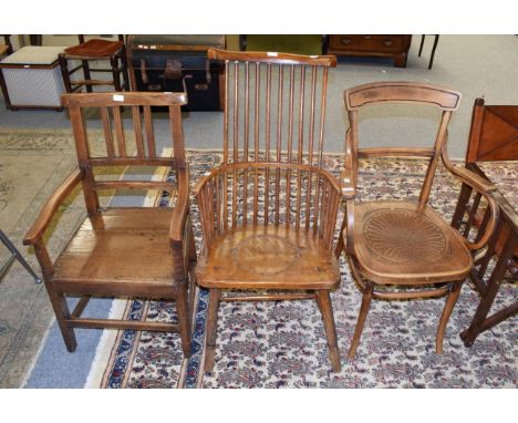 A George III elm plank seated chair; a later stick back chair; and a 20th century bentwood chair (3)