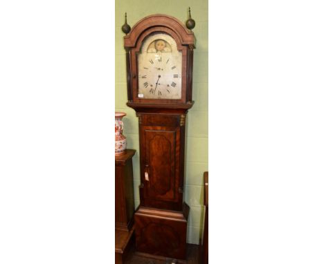 ~ A mahogany eight day longcase clock, one piece silvered arched dial bearing a later inscription George Hancock, Midsummer N