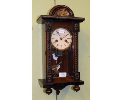 A late 19th century musical wall clock, by Junghans, Roman dial, case of architectural form 