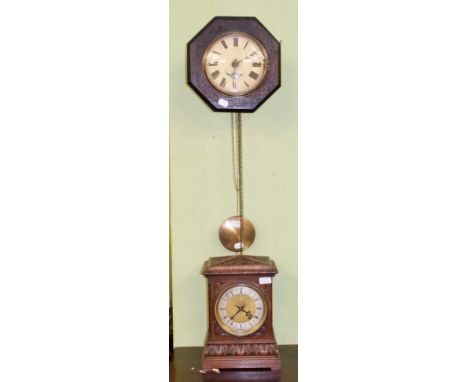 Victorian carved oak mantel clock; together with a late 19th century wall clock with painted dial 