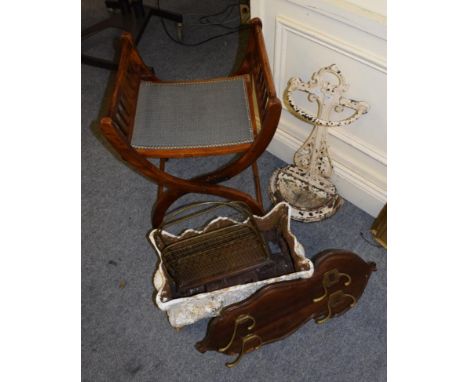 A late 19th century cast iron oblong planter; a similar stick stand; hanging coat rack in mahogany and brass; Marion &amp; Co