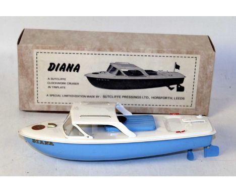 A Sutcliffe Models tinplate and clockwork model of a Diana clockwork cruiser comprising of light blue and white body with bla