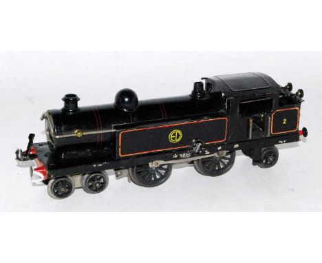A Hornby No. 2 clockwork 1923 tank engine which has been converted to a 4-4-2 black as ED No. 2 would benefit from total rest