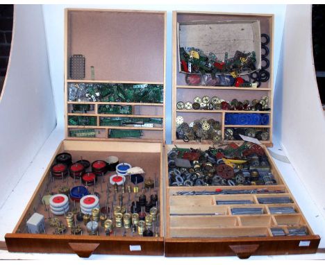 Seven wooden non-Meccano trays containing mainly red and green, some yellow and silver, parts, all in well used condition. NB