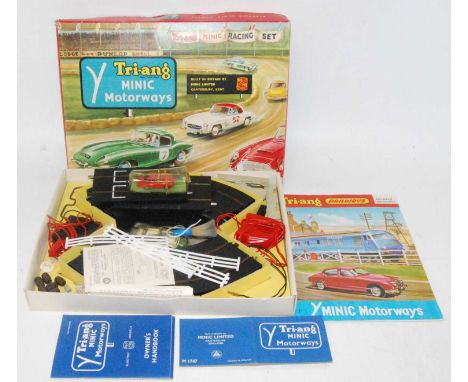 A Triang Minic Roadways set No. M1525 gift set, comprising of two vehicles, various track, throttles, accessories, additional