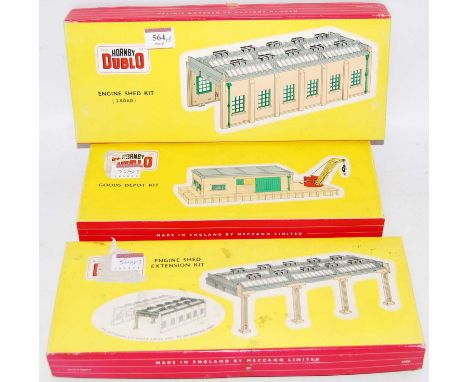 Hornby Dublo 5005 plastic 2 road engine shed (G-BG), 5006 engine shed extension kit (G-BG) and 5020 goods depot kit (G-BG)