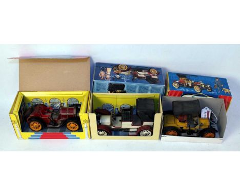 A Schuco Old Timer boxed tinplate and clockwork vehicle group to include a No. 1228 Opal 1909 Old Timer Car, a No. 1225 Merce