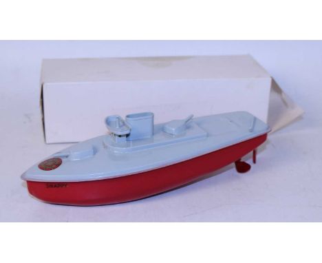 A Sutcliffe Models tinplate and clockwork model of the Snappy gunboat comprising of red and grey body with Snappy lettering t