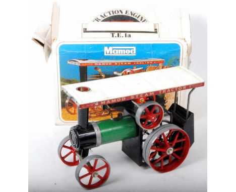 Mamod TE 1a traction engine, which would benefit from cleaning, sold in poor condition outer box and with steering rod and fi