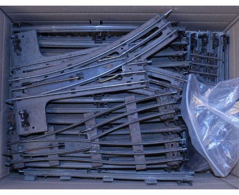 Box of pre-war Hornby electric 0 gauge track, sloping sleepers: 43 full straights; 26x2' curves; 2x parallel points; one 2' L