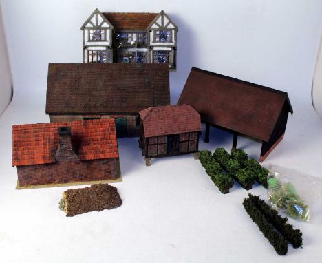 Two boxes containing a quantity of very well made farm buildings and facades, mixed manufactures to include George's Model Fa