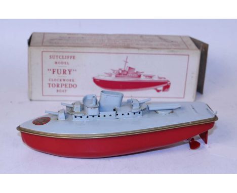 A Sutcliffe Models tinplate and clockwork model of a Fury Torpedo boat comprising of grey, red and gold body with Sutcliffe M
