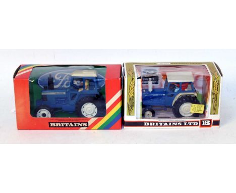 A Britains boxed tractor group to include a No. 9523 Ford TW 20 tractor and a No. 9524 Ford 6600 tractor, both housed in the 
