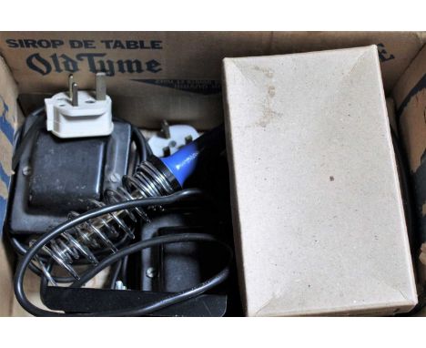 Three Trix Twin transformers and a 240v/40w KTB-40 soldering iron, all appear visually good, with No. 1243 level crossing - a