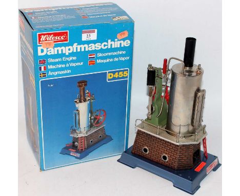 Wilesco D455 horizontal steam engine comprising of vertically housed boiler with single cylinder, vertical steam engine power